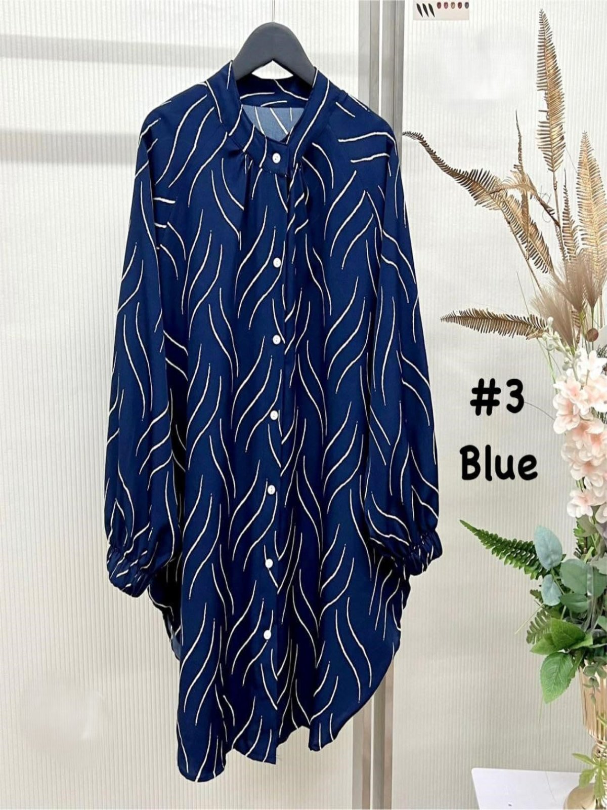 Top Blouse Casual Flowy Tunic with Abstract Wave Patterns Blue model 3 (#J50KNG) - Muslimah Woman's Fashion Wardrobe